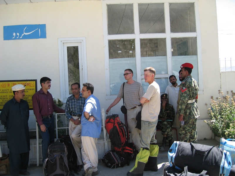 Waiting in the Skardu Airport for the flight to Isklamabad: In the middle of the picture Captain Artif (with a light blue shirt), Carsten and Hans (August 6th. 2004)